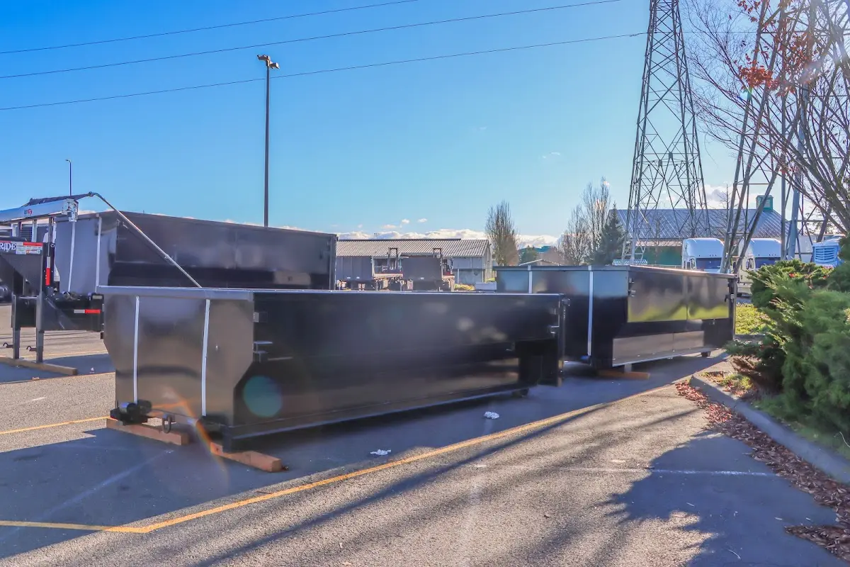 Roll-off dumpster ready for waste disposal at job site for Construction Dumpster Rental in Rose Hill